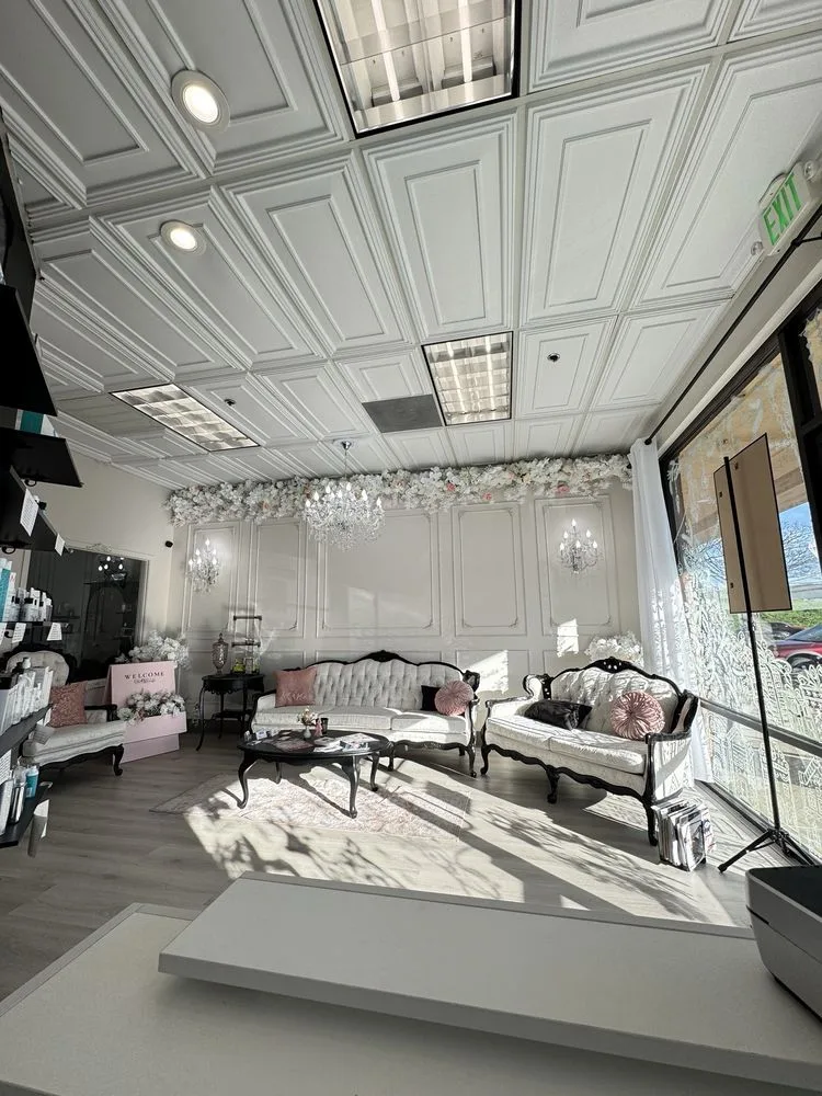 GioBBeauty waiting lounge with velvet sofas