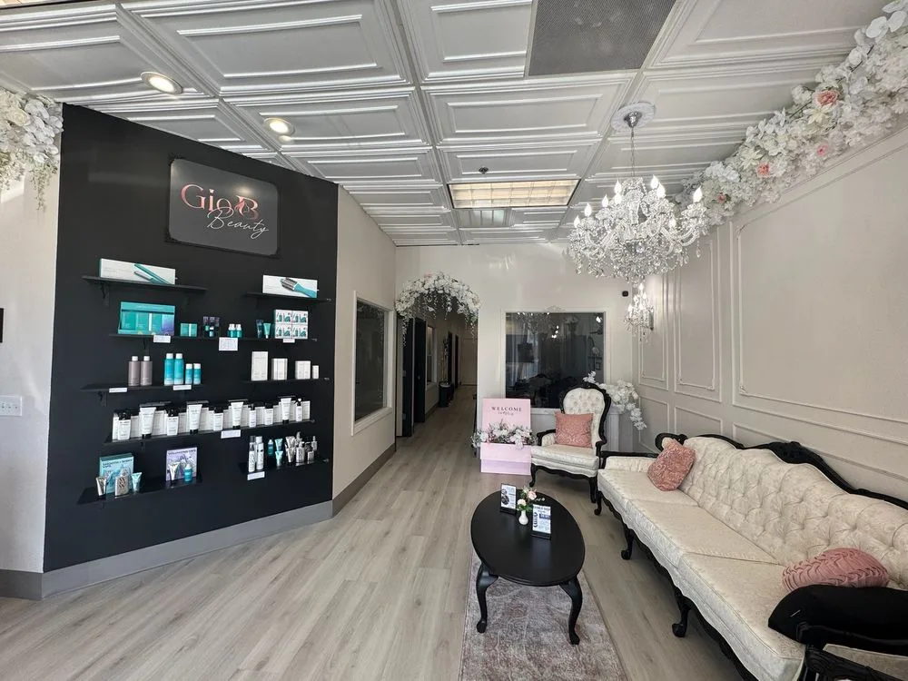GioBBeauty lounge with chandelier and product wall